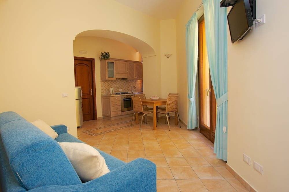 Apartment mit Schlafzimmer und Terrasse 1