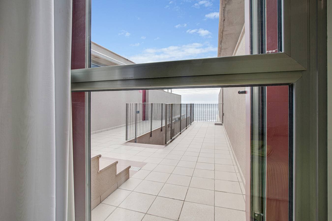 Foto 11 von 22: Ferienwohnung "Casa Médano 18" mit Blick auf das Meer und die Berge und WLAN