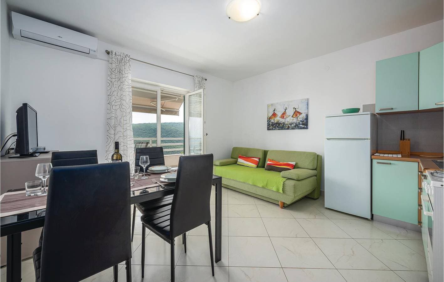 Foto 8 von 20: Gemütliche Ferienwohnung mit Terrasse, Klimaanlage, WLAN und nur 500 m vom Strand entfernt