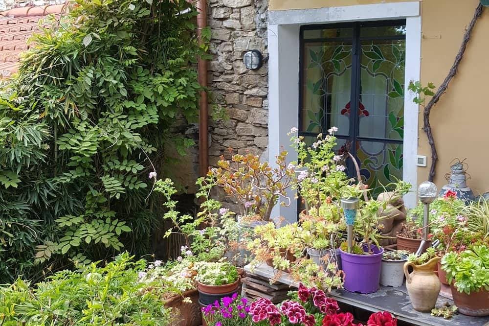 Foto 10 von 25: Apartment Mit Großem Terrazzo Und Garten In Ruhigem Italienischem Dorf