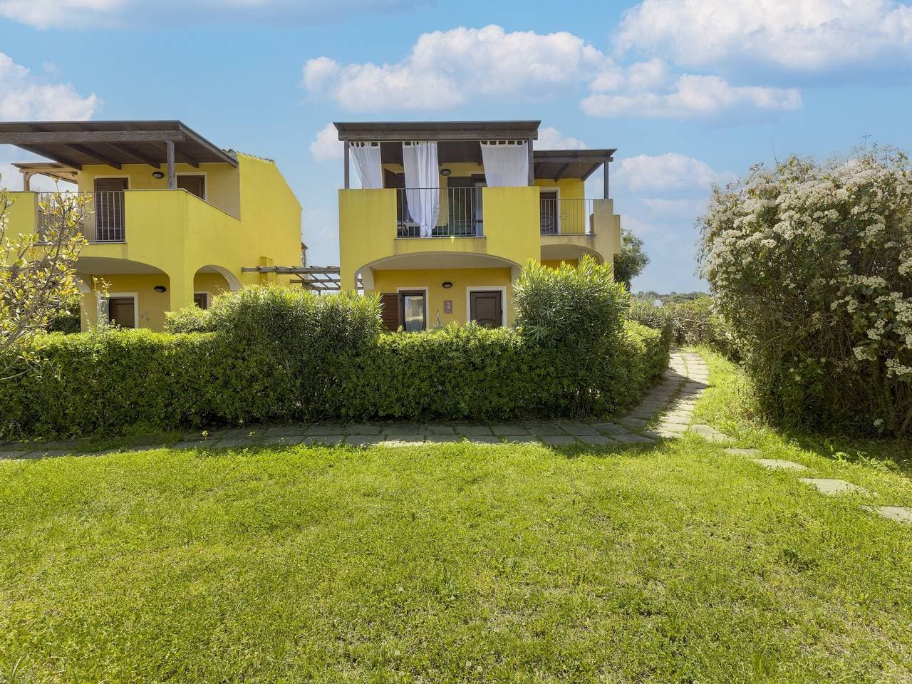Foto 2 von 31: Ferienhaus mit Klimaanlage und Gemeinschaftspool