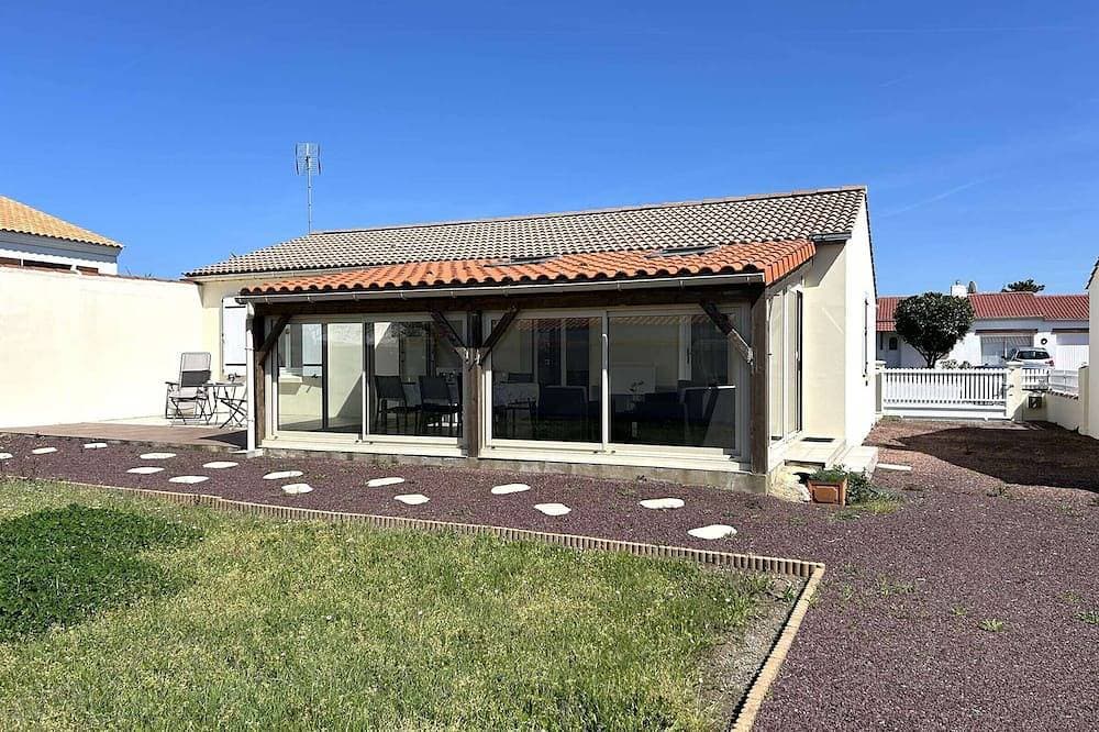 Unabhängiges Haus auf einer Ebene, 6 Schlafplätze, nah am Strand, mit Garten und Veranda 1
