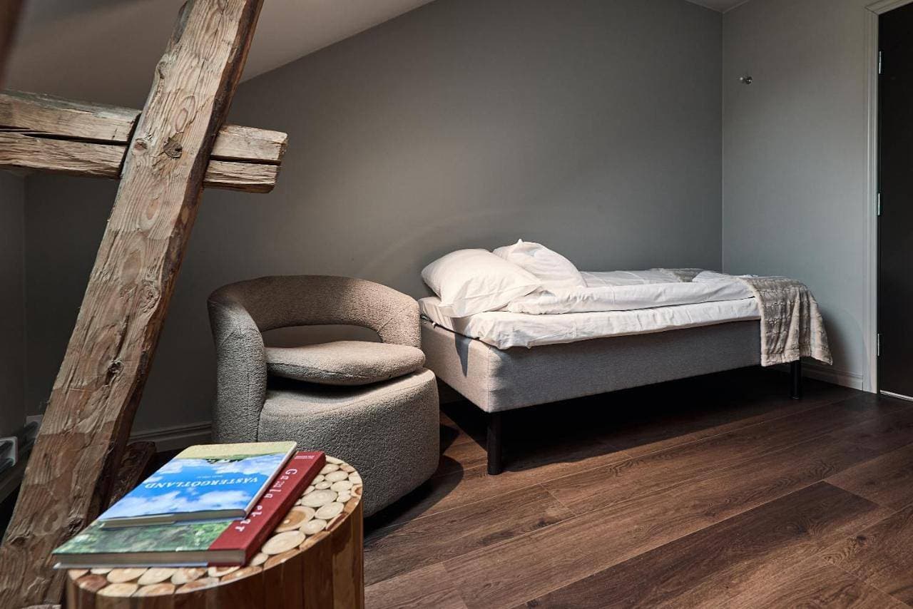 Foto 7 von 12: Triple Room with Shared Bathroom