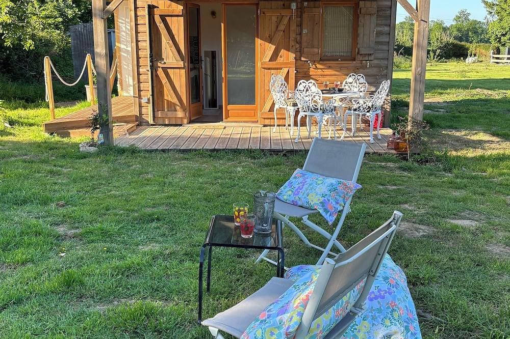 Foto 10 von 15: A cottage in an orchard