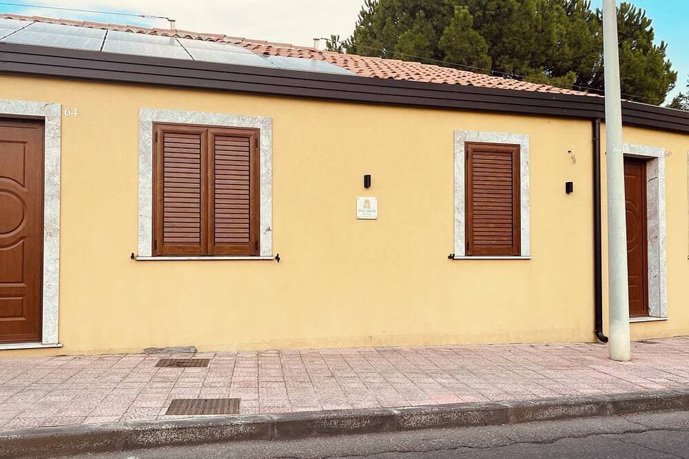 Foto 10 von 14: Relaxation, comfort, and nature, with on-site parking and a terrace, just 5 minutes from the beach.