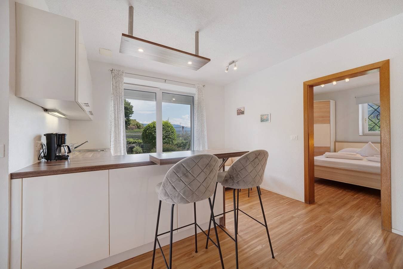 Foto 7 von 22: Ferienwohnung "Mayenburg" mit Bergblick, Gemeinschaftsgarten und Pool