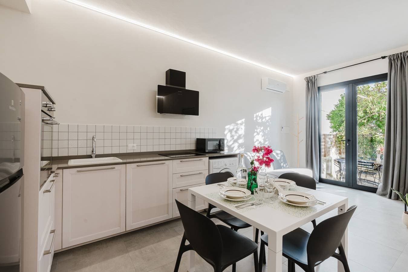 Foto 4 von 20: Apartment 'Vento E Salsedine Tramontana' mit privatem Garten, WLAN und Klimaanlage
