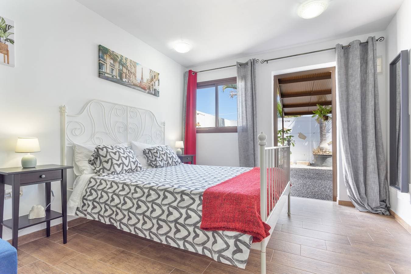 Foto 4 von 25: Ferienwohnung 'Las Palmeras B' mit Meerblick, Gemeinschaftsterrasse und Gemeinschaftsgarten