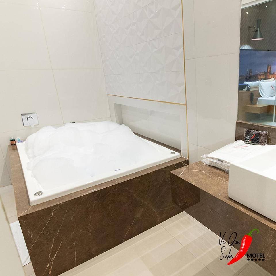 Foto 6 von 10: Deluxe Suite with Spa Bath