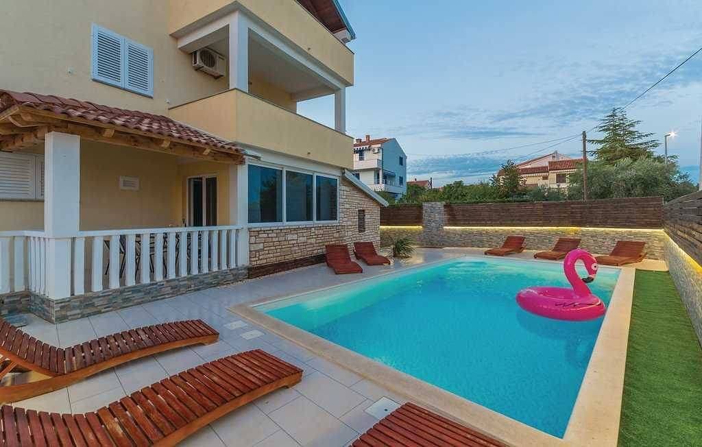 Foto 10 von 19: Ferienwohnung für 2 Gäste mit Terrasse & Gemeinschaftspool - nur 150m zum Strand