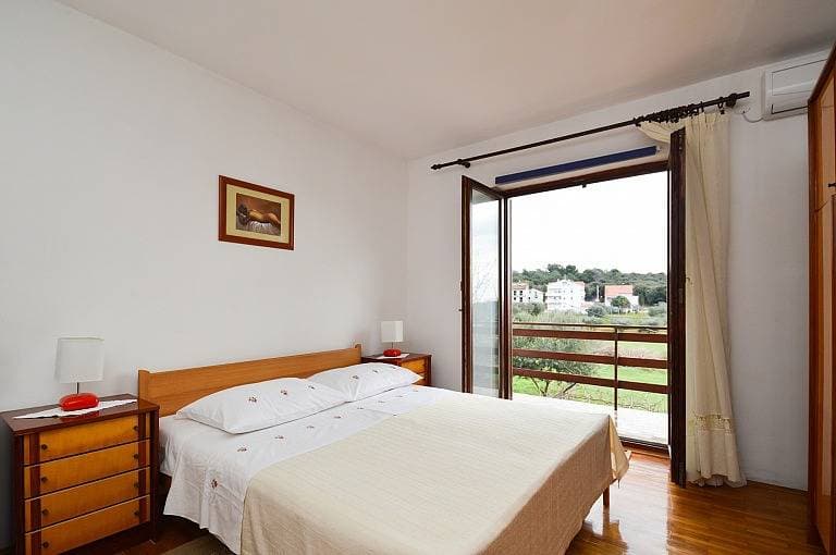 Foto 9 von 21: Ferienwohnung für 8 Personen mit Balkon