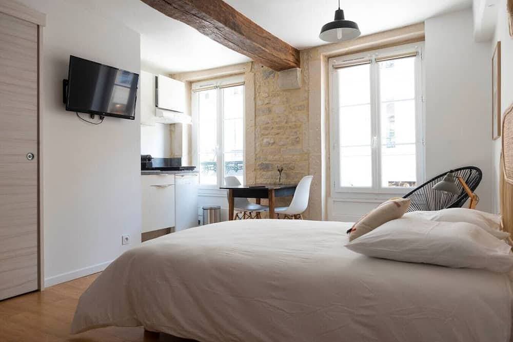 Foto 2 von 21: Charming studio apartment right in the heart of downtown
