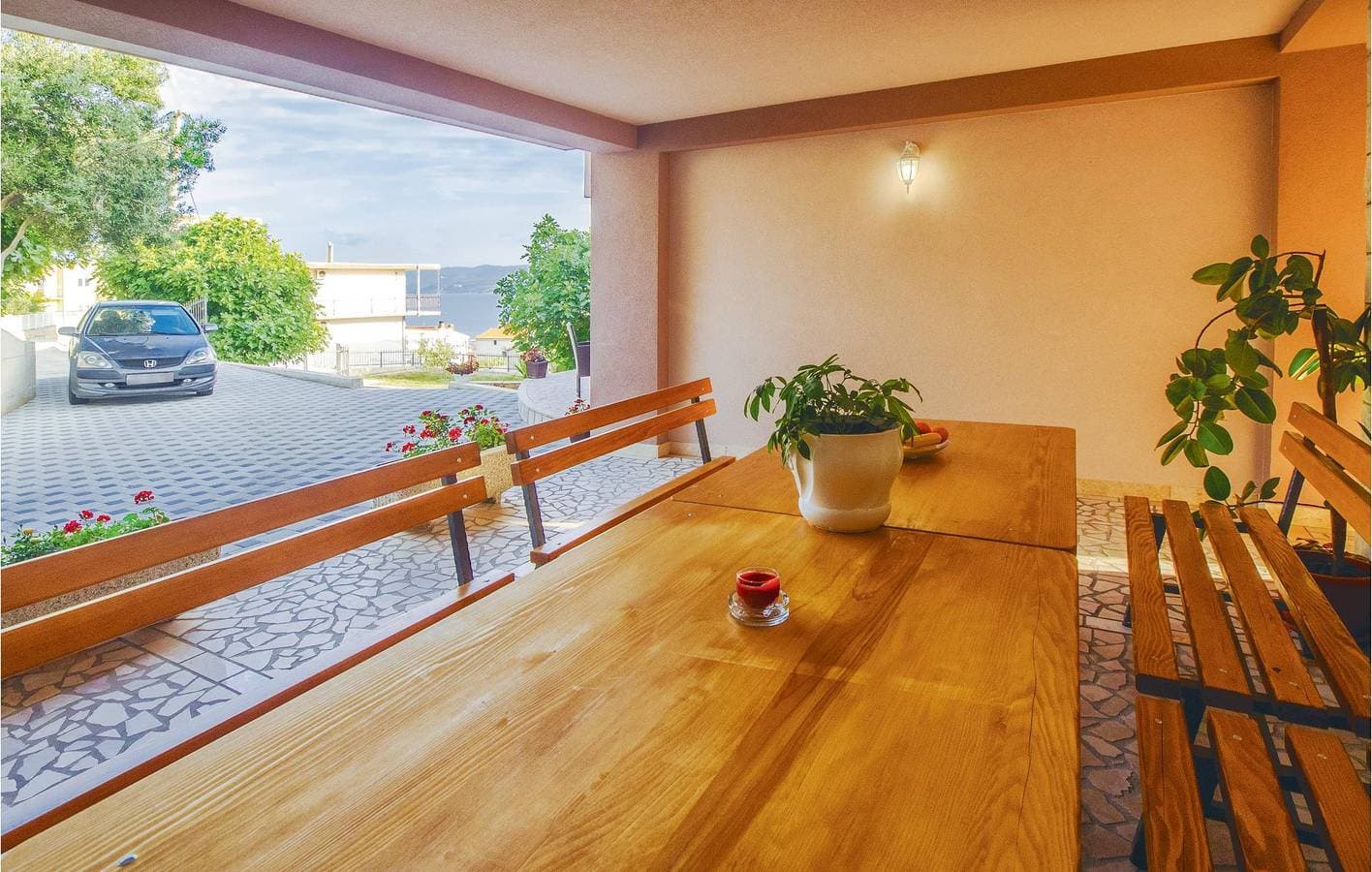 Foto 10 von 24: Gemütliche 300 m zum Strand: Klimatisierte Wohnung mit Terrasse und Parkplatz