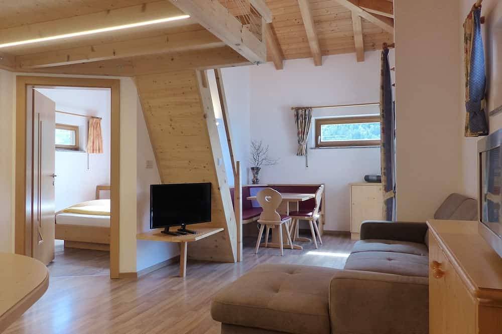Ferienwohnung für 2-4 Pers. mit Südbalkon und biologischem Naturbadeteich 1