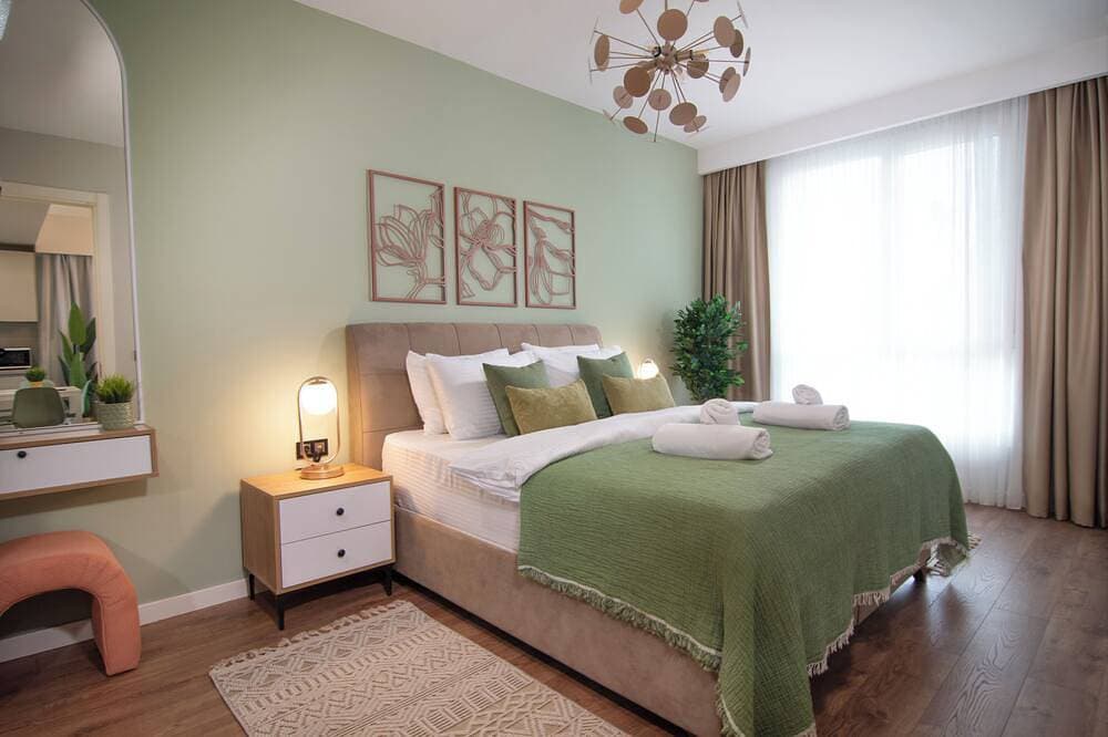 Foto 2 von 30: Brand new cozy 2Br Apt