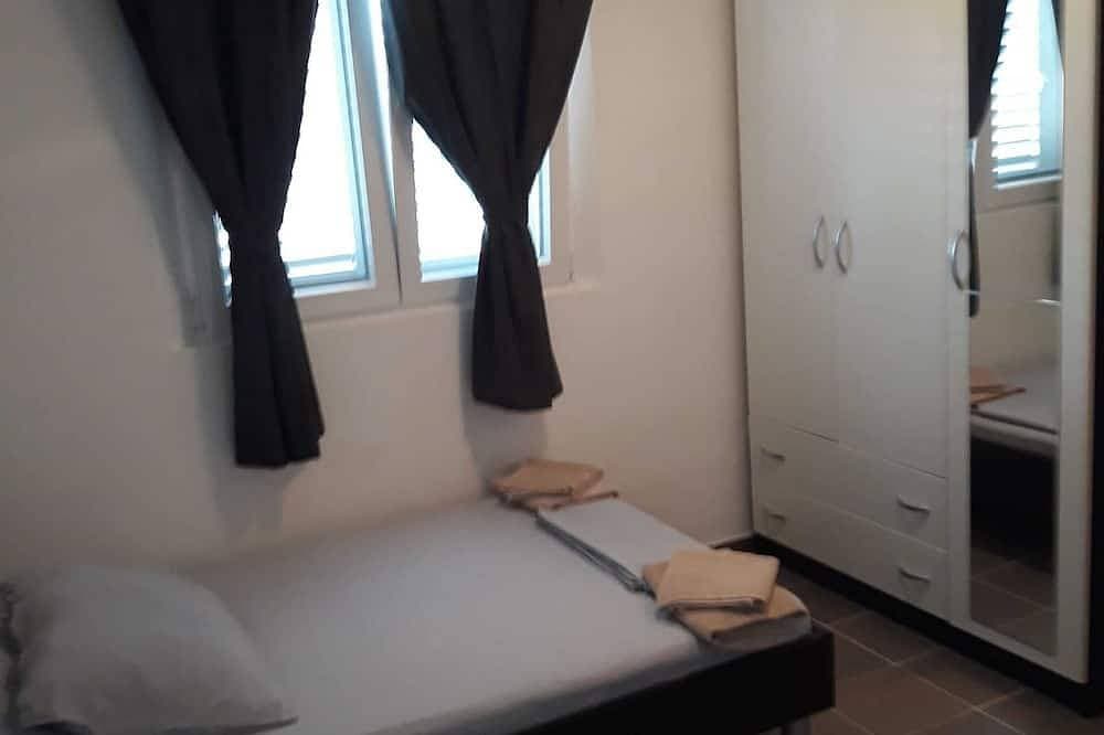Foto 3 von 10: Limuni 2-Zimmer-Wohnung mit Terrasse