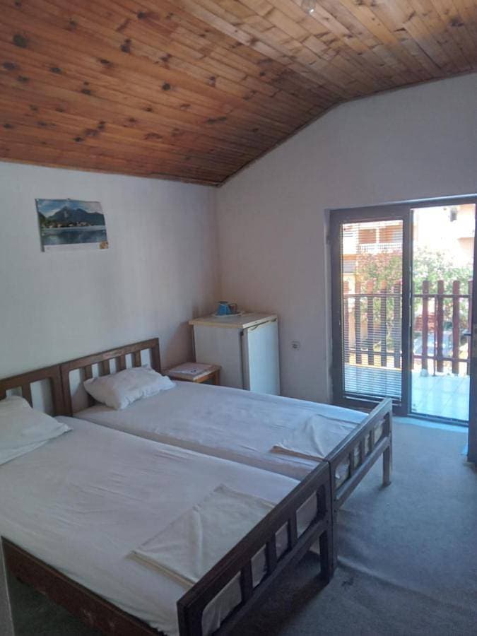 Foto 5 von 11: Basic Triple Room with Shared Bathroom