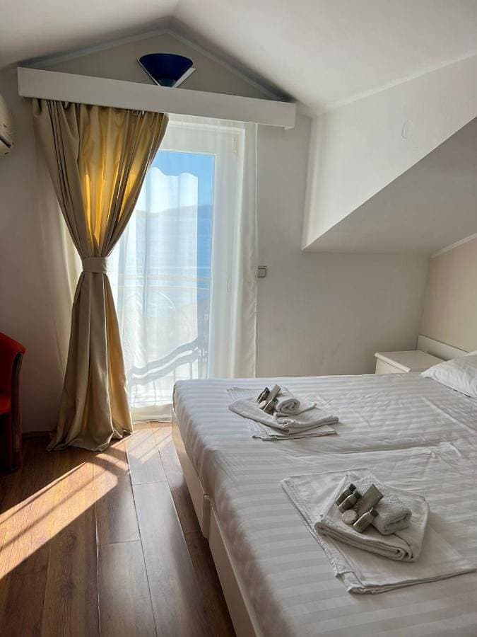 Foto 5 von 5: Deluxe Triple Room with Sea View