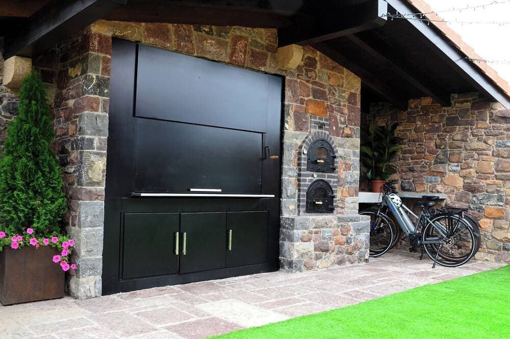 Foto 12 von 15: Top category rural house in Asturias - Garden, fireplace and relax.