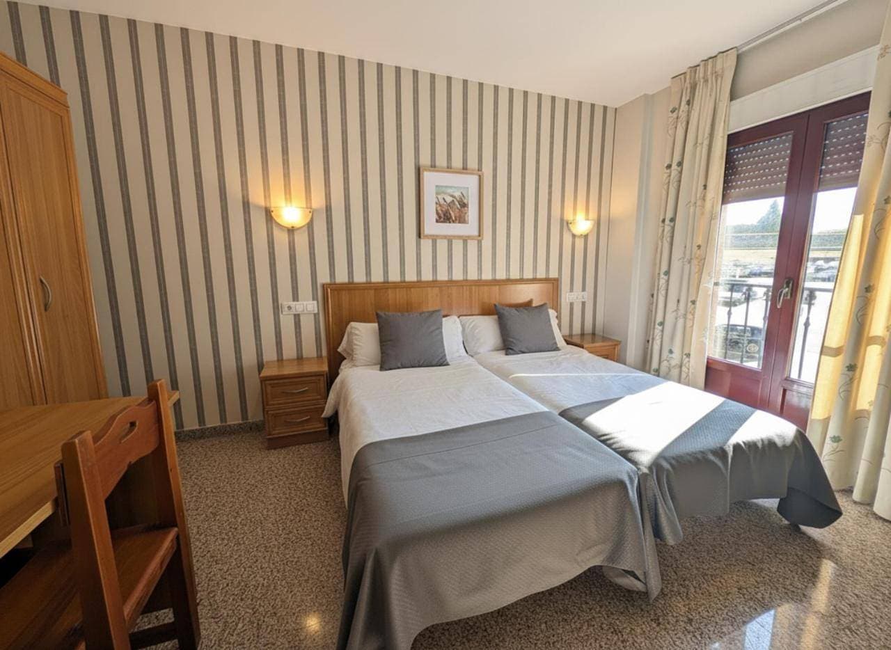 Foto 7 von 14: Double Room with Air  Conditioning and Private Bathroom