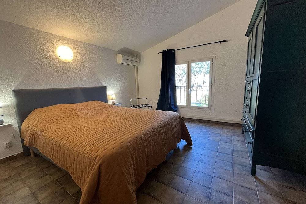 Foto 3 von 15: Duplex climatisé en bord de mer avec terrasse, jardin et parking, à 20m de la plage et commerces à pied
