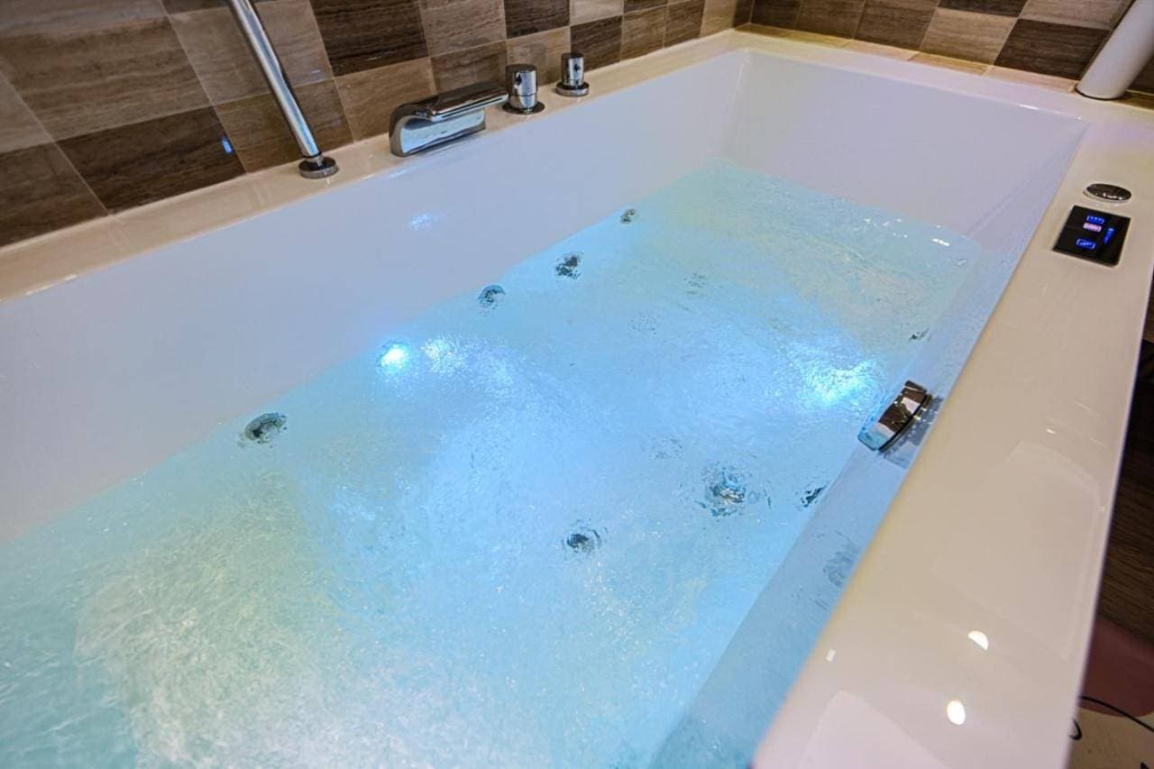 Foto 8 von 8: Double Room with Spa Bath