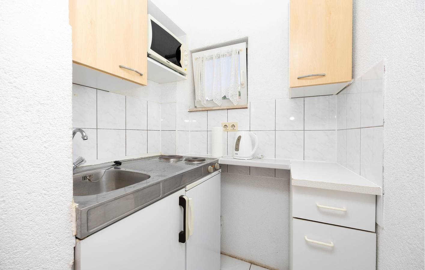 Foto 13 von 25: Apartment mit Meerblick, Wifi, AC, Pool und Terrasse