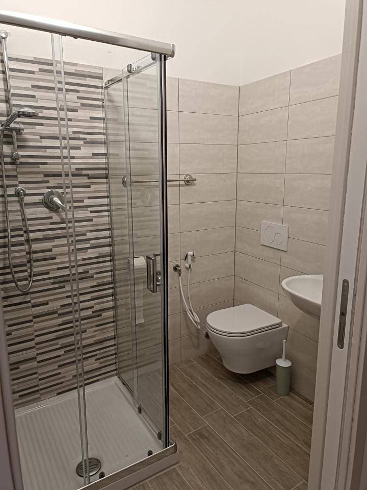 Foto 10 von 13: Triple Room with Private Bathroom