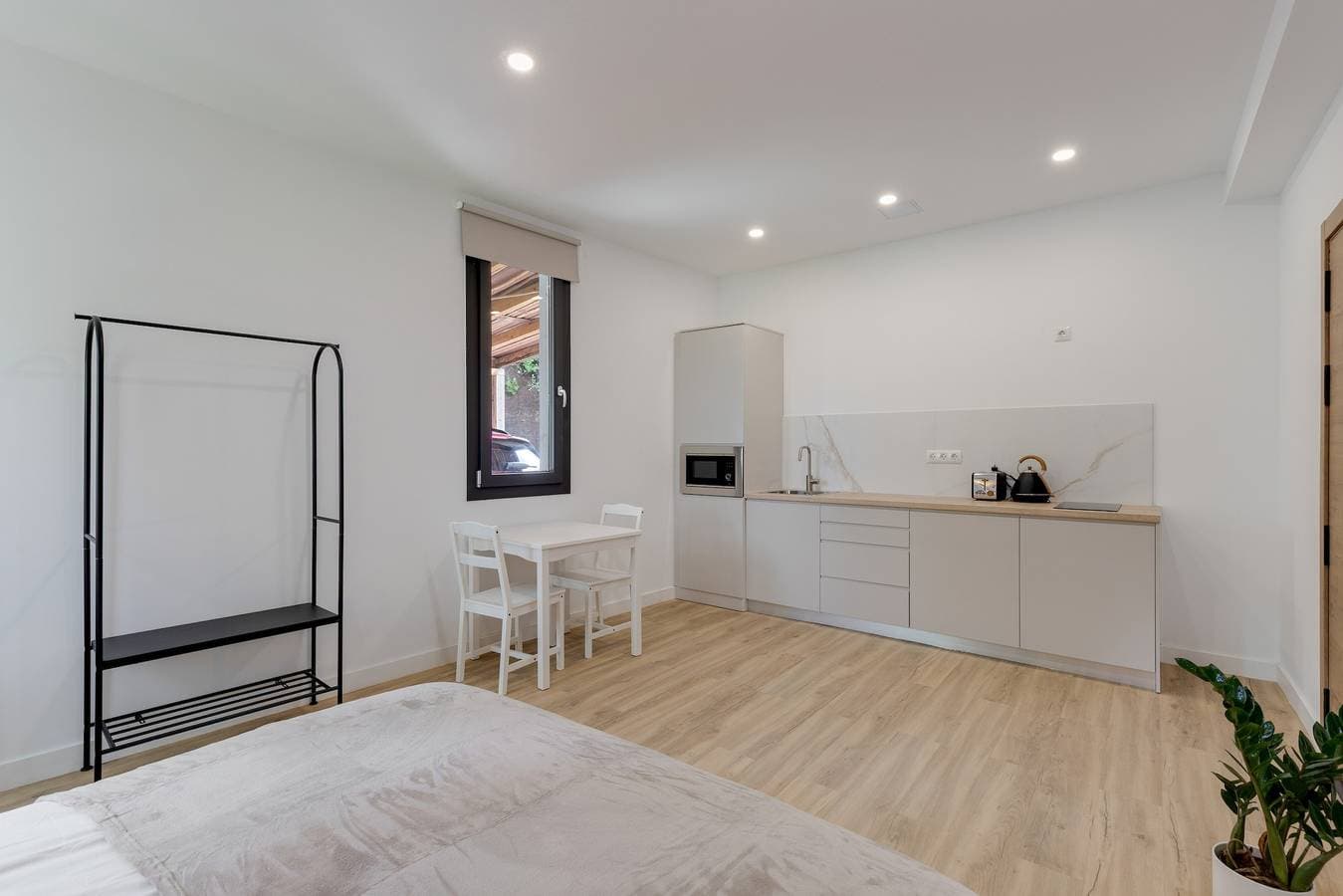 Foto 10 von 29: Ferienwohnung 'Apartamento 1' mit Bergblick, Gemeinschaftsterrasse und Garten