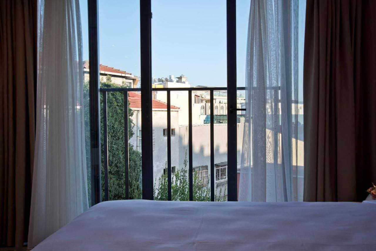 Foto 7 von 27: Deluxe Double Room with Side Sea View