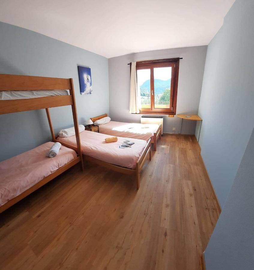 Foto 2 von 44: Economy Quadruple Room with Shared Bathroom