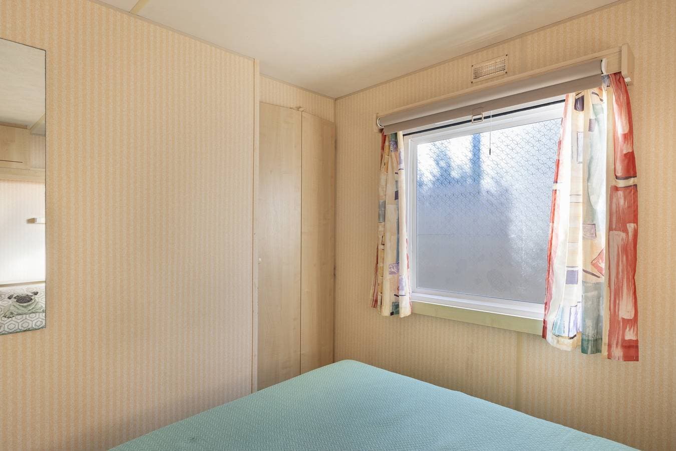 Foto 10 von 23: Mobilheim 'Manoli' mit privatem Garten und Balkon