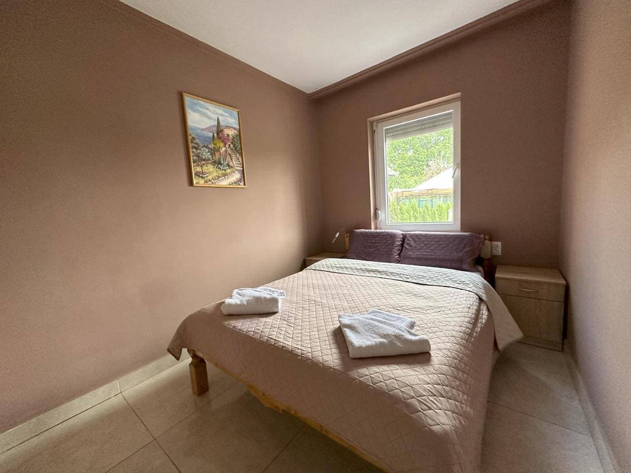 Foto 7 von 11: Triple Room with Private Bathroom