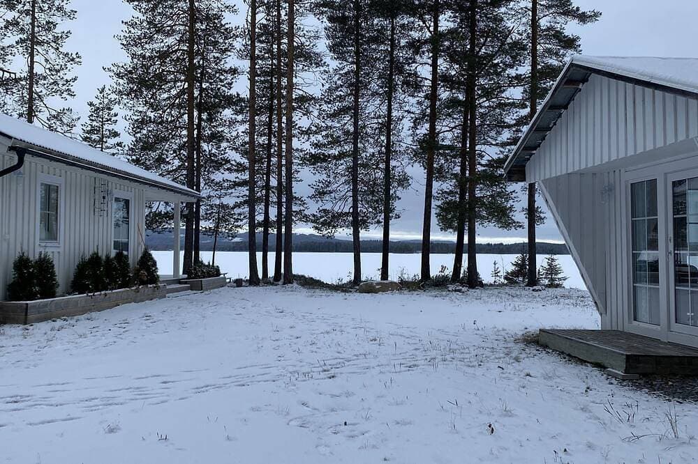 Foto 11 von 30: Cozy Forest Cabin by the Lake