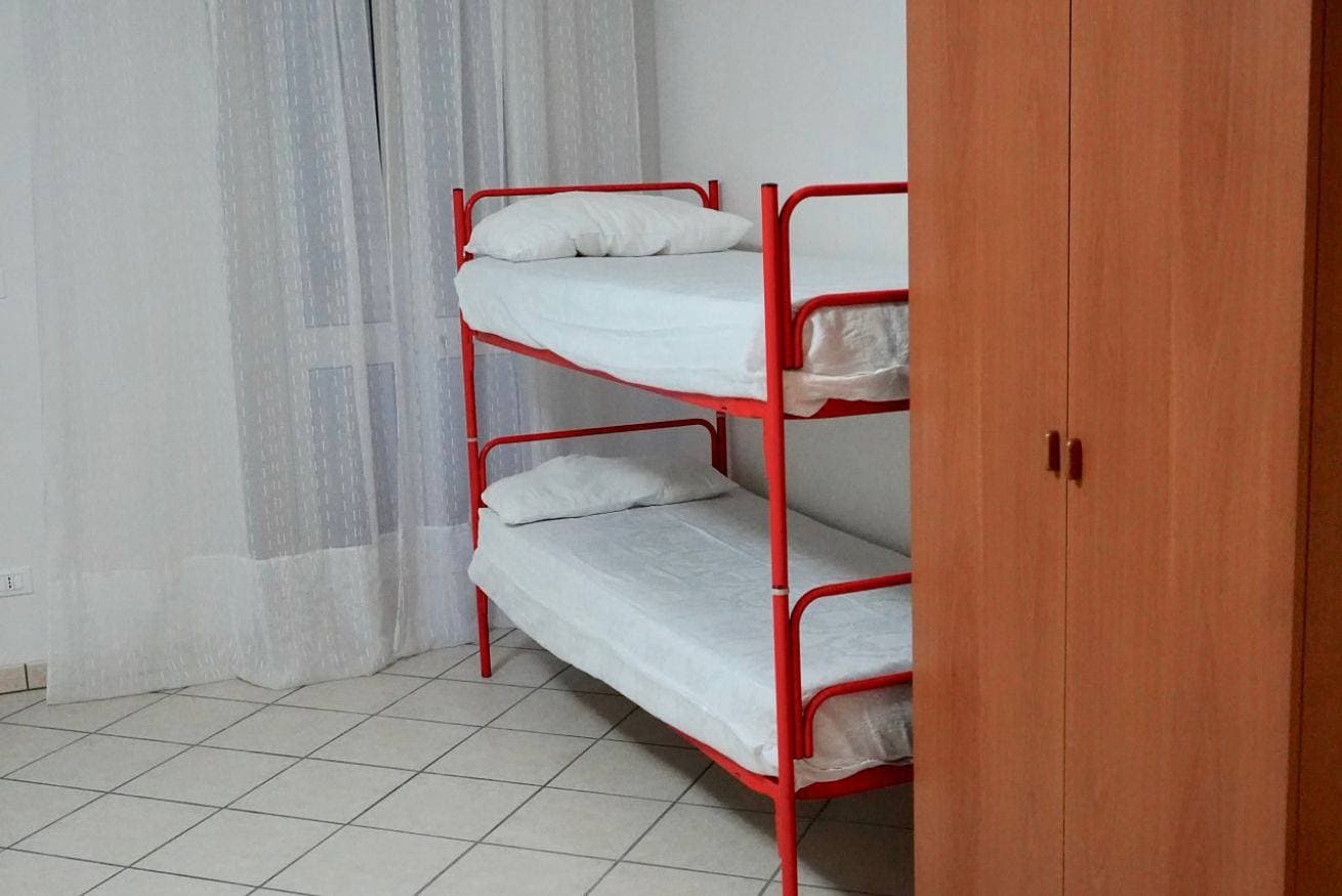 Foto 11 von 34: Ferienwohnung für 8 Personen mit Garten