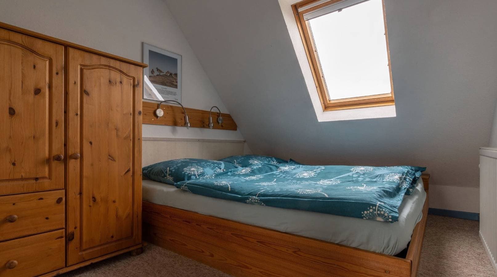 Foto 9 von 12: Ferienwohnung Silbermöwe mit Gemeinschaftsterrasse, Gemeinschaftsgarten und Wi-Fi