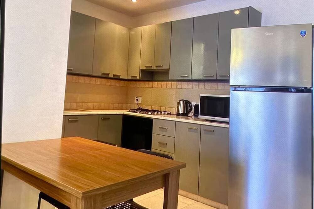 Foto 11 von 13: Cozy 2-Bed Apartment by the Kings Avenue Mall