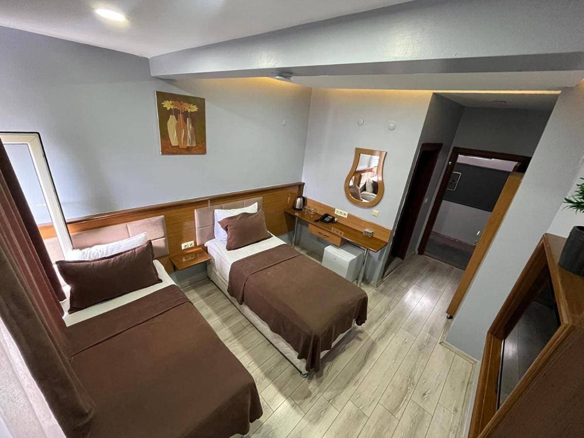 Foto 5 von 13: Basic Triple Room