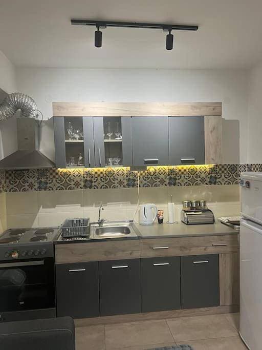 Foto 9 von 12: Cozy Apartment in Skopje