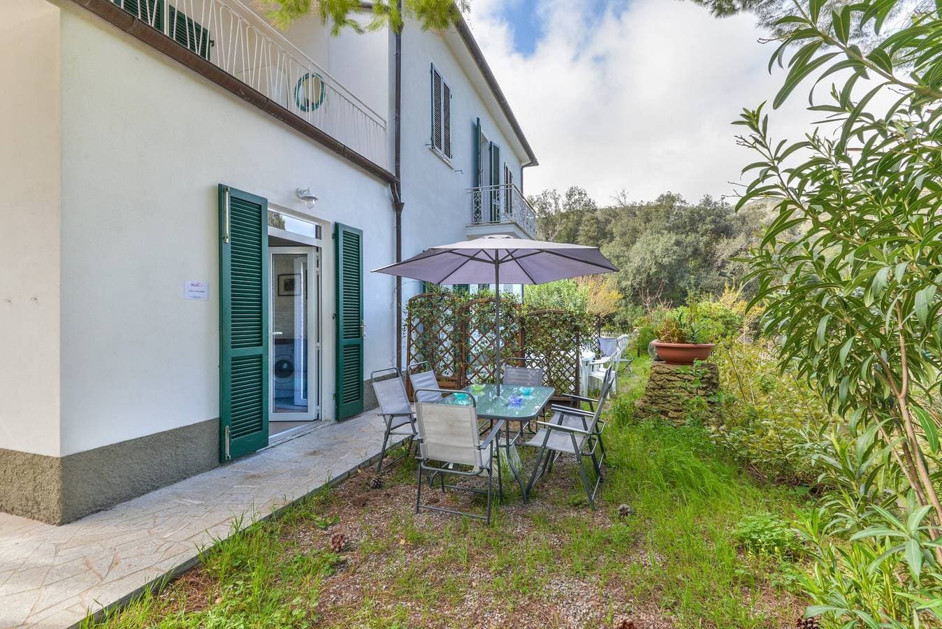 Foto 4 von 22: Apartment 'Casa Annameri' mit privatem Garten, WLAN und Klimaanlage
