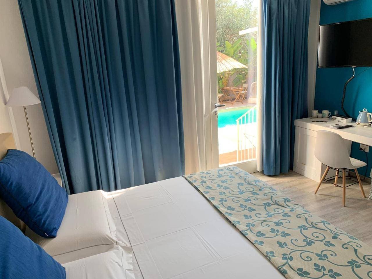 Foto 7 von 19: King Room with Pool View