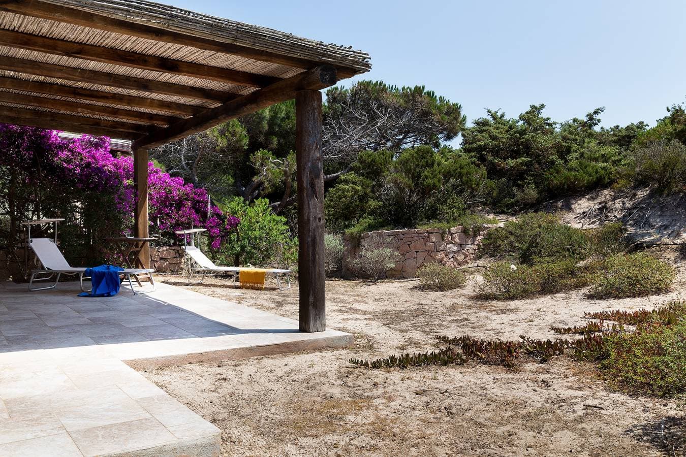 Foto 6 von 32: Villa 'I Graniti' in Strandnähe mit Meerblick, Patio, Klimaanlage und WLAN