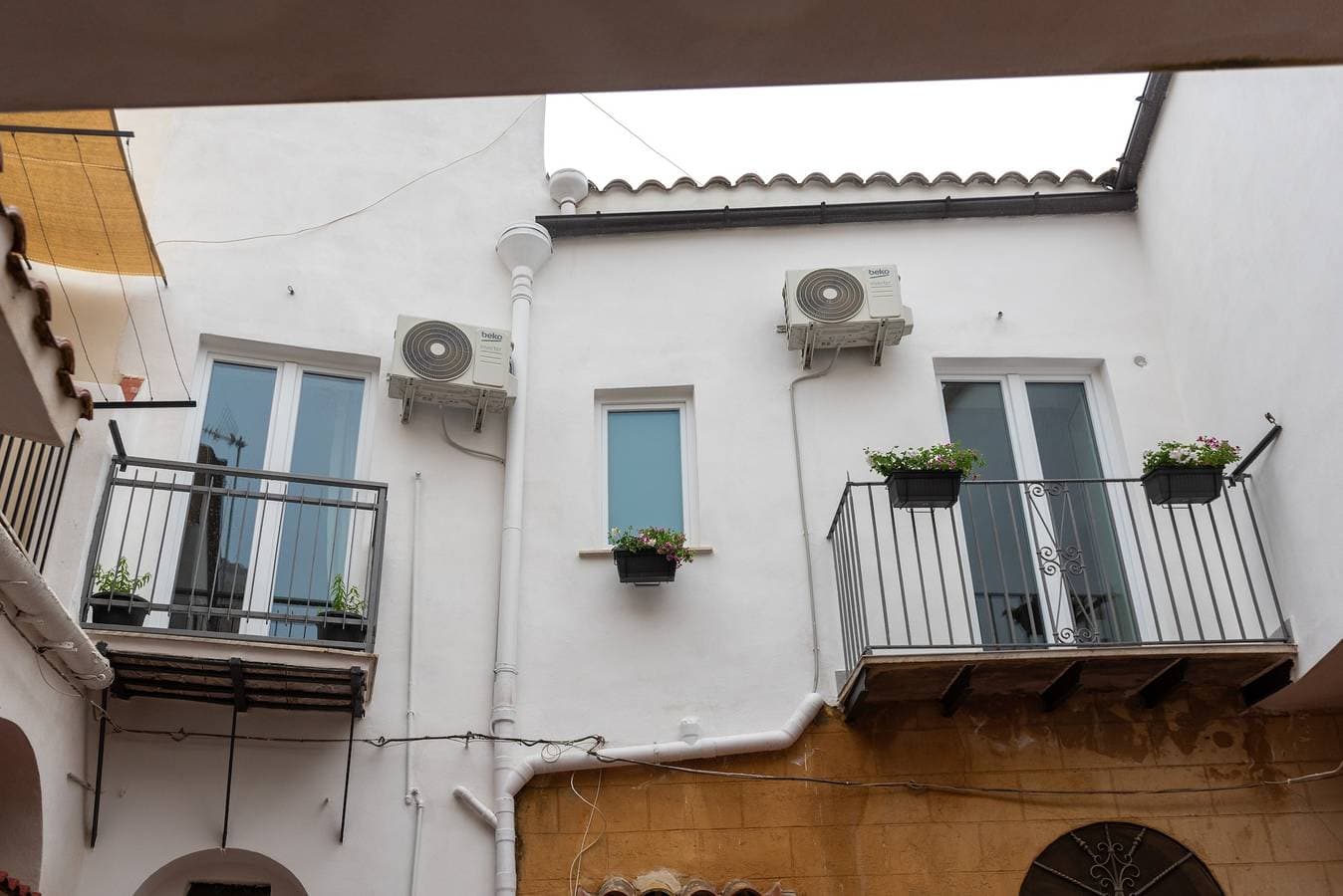 Foto 4 von 26: Zimmer 'Donna Letizia – Doppelzimmer' mit Balkon, WLAN und Klimaanlage