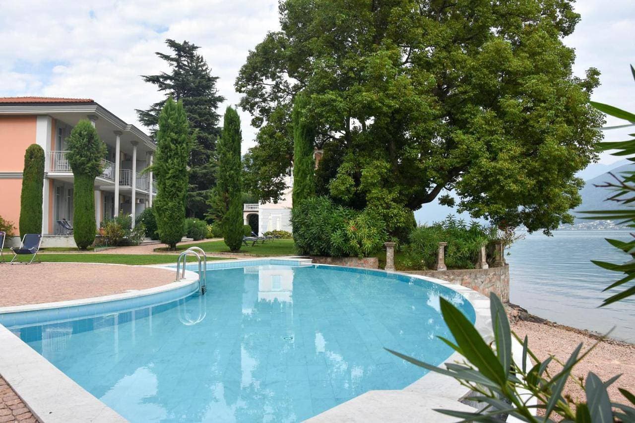 Cozy apartment on the lake, with pool, terrace and free parking - Casa Felice 1