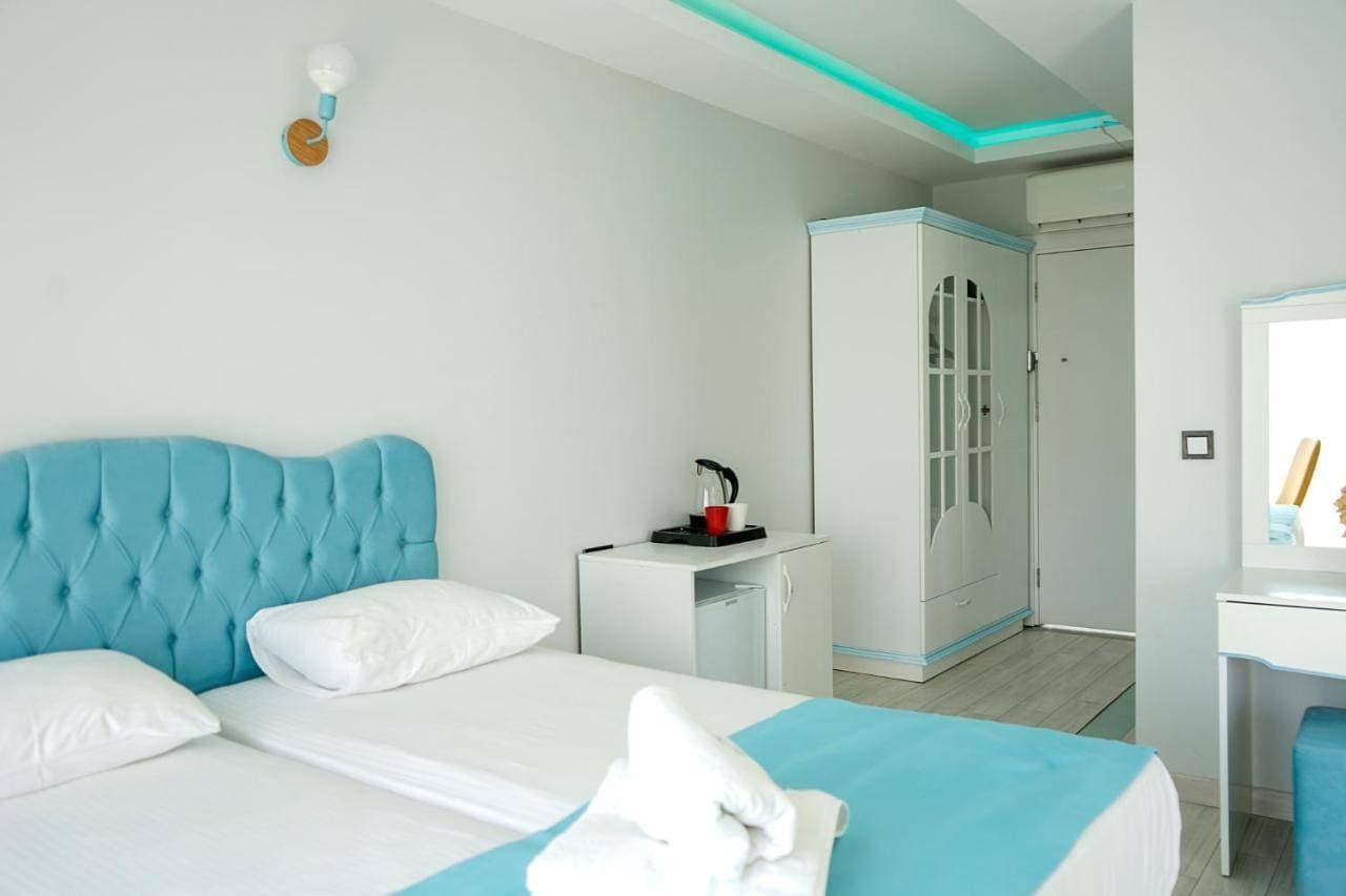 Foto 10 von 10: Quadruple Room with Sea View