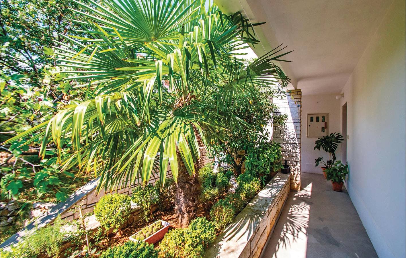 Foto 9 von 27: Charmante Ferienwohnung in Strandnähe mit Terrasse und Parkplatz