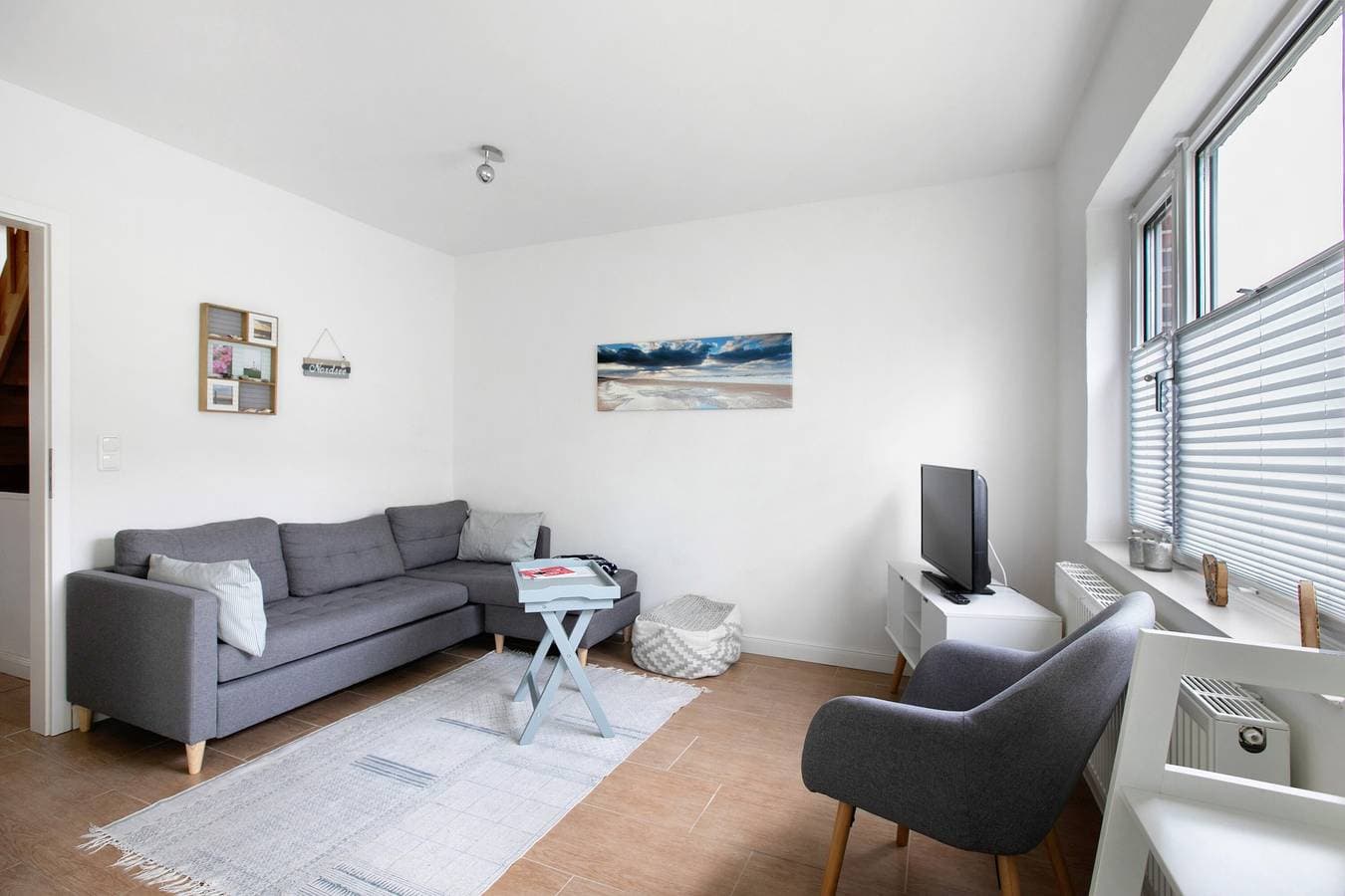 Foto 2 von 25: Ferienhaus 'Haushälfte Am Süderhafen' mit privater Terrasse, Garten und WLAN