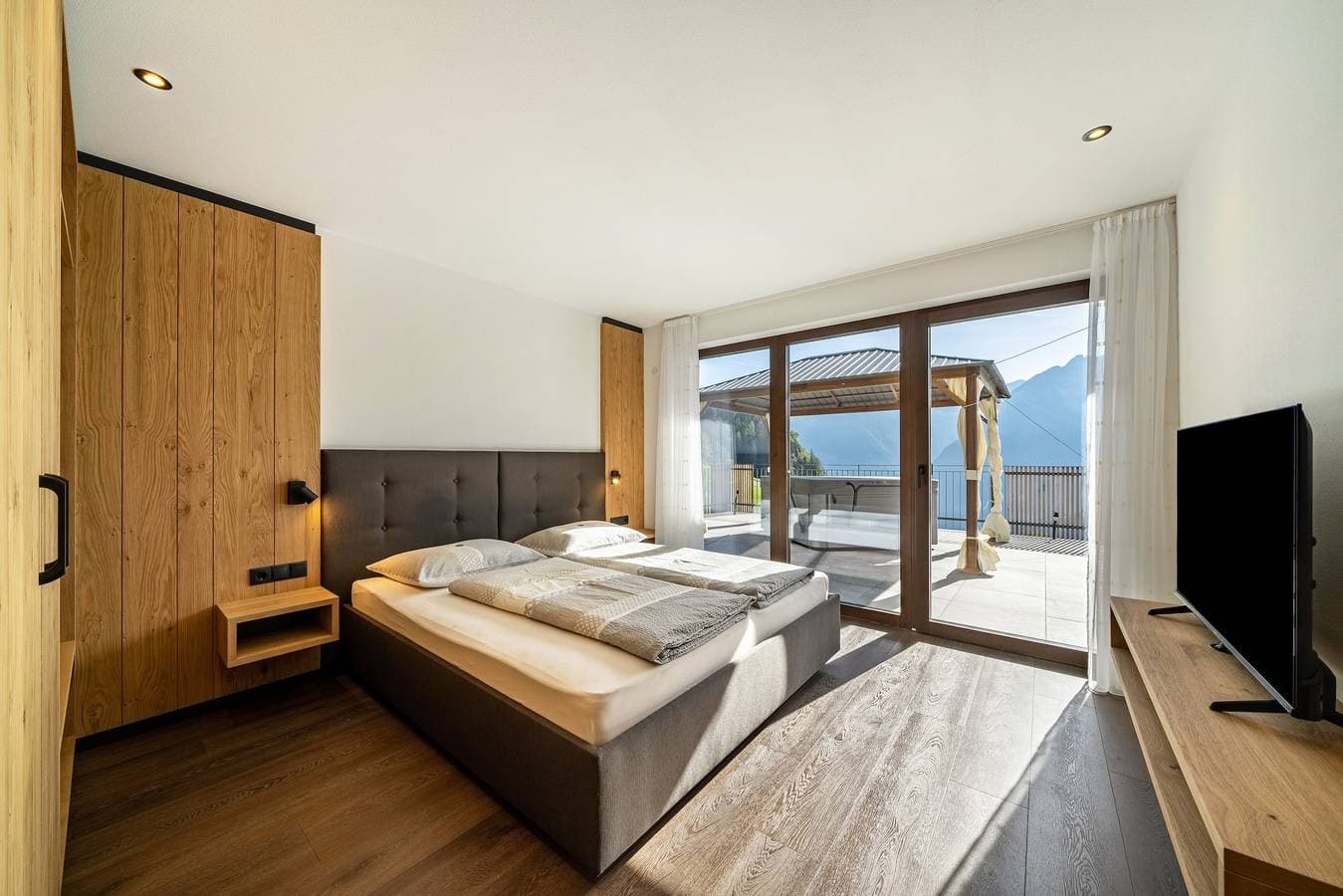 Foto 9 von 19: "Sunnseitn Lodge Apt Exclusive Panorama" mit beheiztem Whirlpool, Infrarotsauna und großer Terrasse