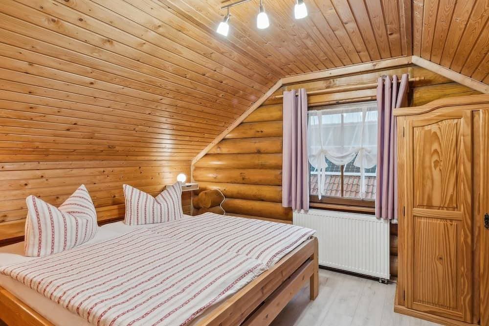 Foto 2 von 20: Gemütliches Holzstammhaus mit Garten im Harz