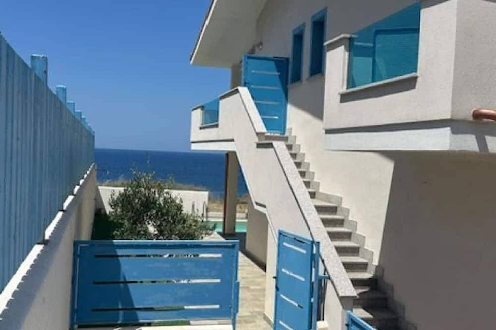 Foto 8 von 18: Villa Tramonto : Wohnung im Erdgeschoss mit direktem Meerblick